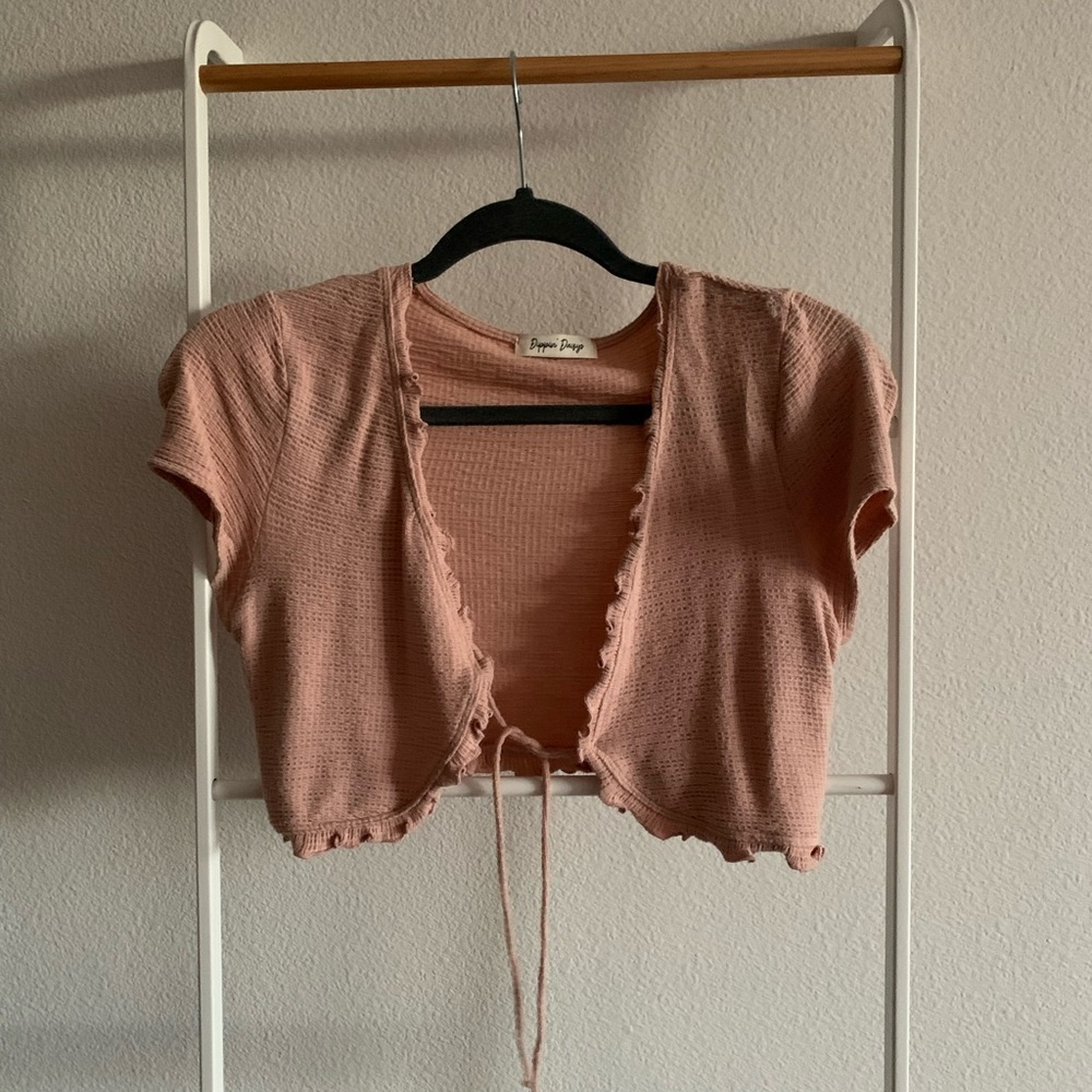 Salmon pink crop top with a tie front